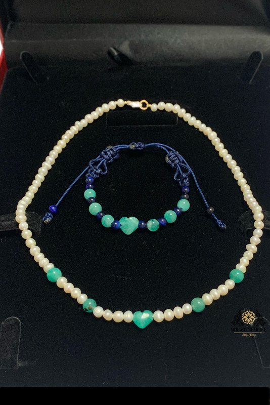 Unique and exclusive teens woman necklace and girls bracelet set handmade of Natural 5-7mm Pearls, 2 heart shape 10 Emeralds and a 18k gold plated clasp.