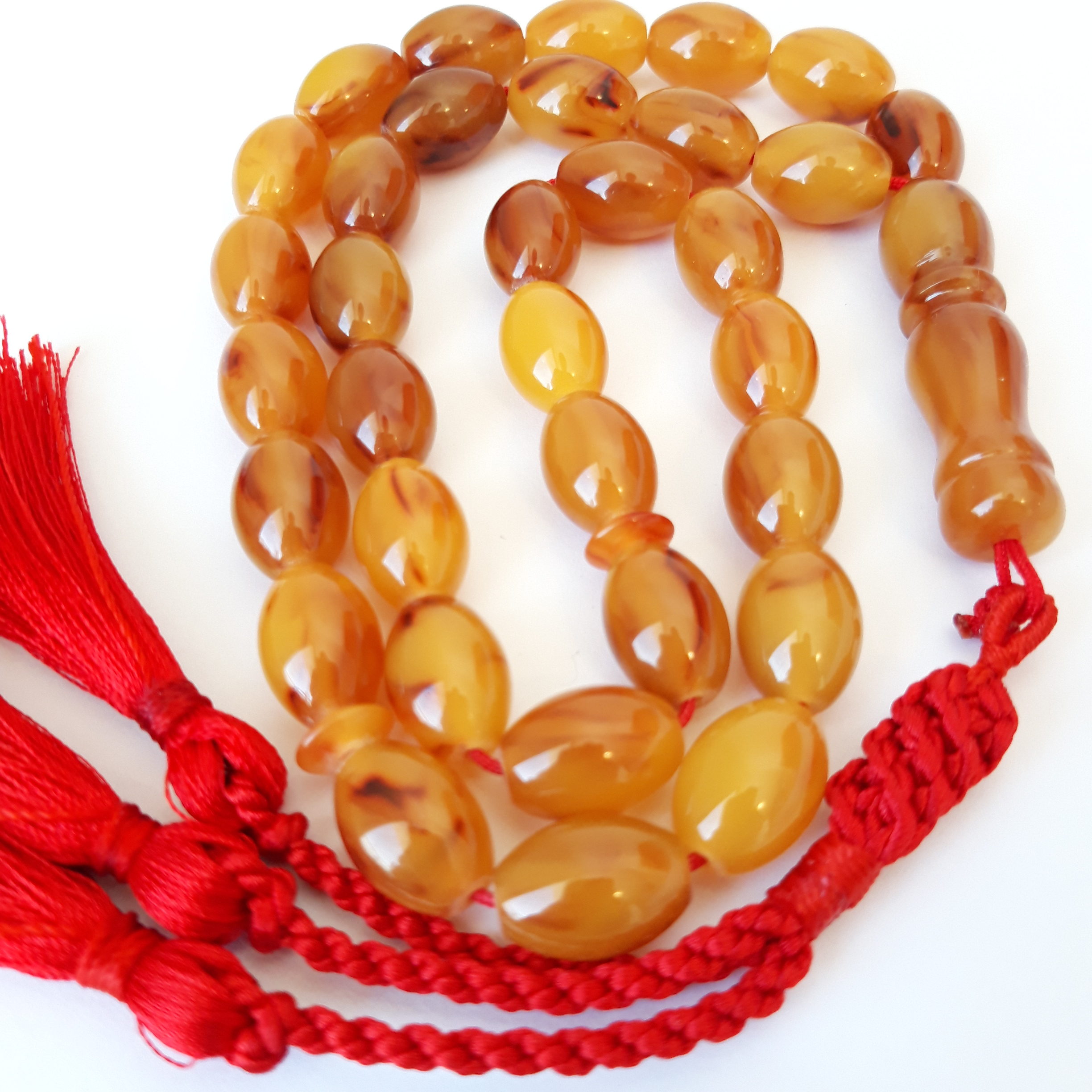 Deep honey natural amber sand, red handmade tassel - Image 2