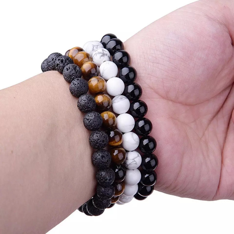 4 Bracelets Set
Natural Tiger eye, Howlite, Lava Stone & Black Onyx - Image 2